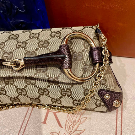 Sold Gucci Horsebit 1955 Chain Bag Gucci Monogram Iridescent Purple Leather and Gold Studs