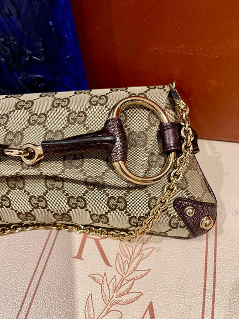 Sold Gucci Horsebit 1955 Chain Bag Gucci Monogram Iridescent Purple Leather and Gold Studs