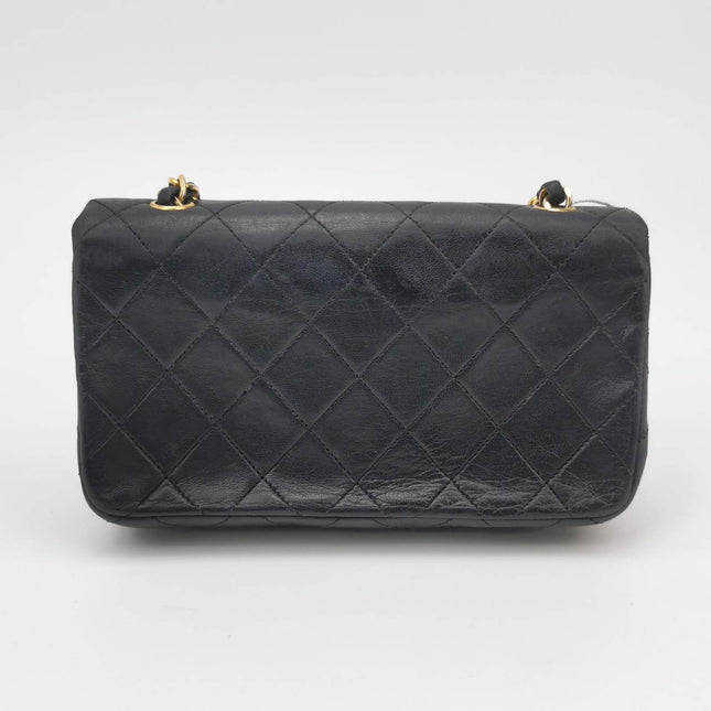 Sold Chanel Classic Flap Mini Vintage 1989-1991 Black Lambskin Leather with 24k Gold Hardware