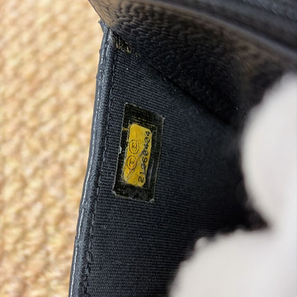 Chanel Wallet on Chain Classique rabat en cuir grainé noir, finition argentée