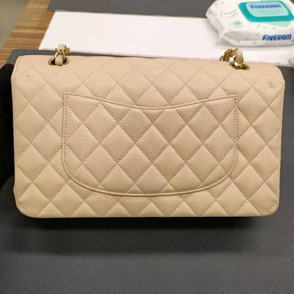 Sold Chanel Timeless Classic Flap 2011 Medium Beige Caviar Leather Gold HW