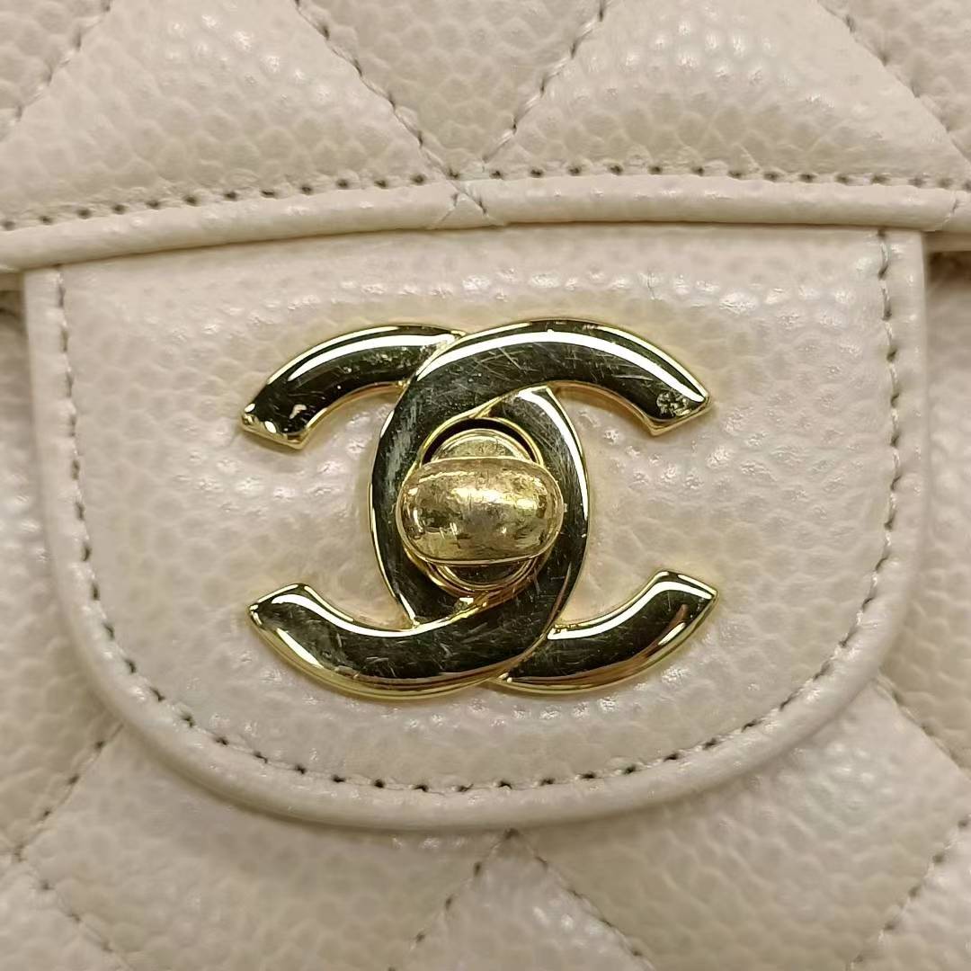 Sold Chanel Timeless Classic Flap 2011 Medium Beige Caviar Leather Gold HW