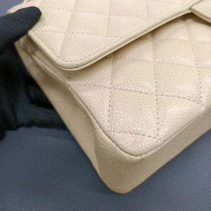 Sold Chanel Timeless Classic Flap 2011 Medium Beige Caviar Leather Gold HW