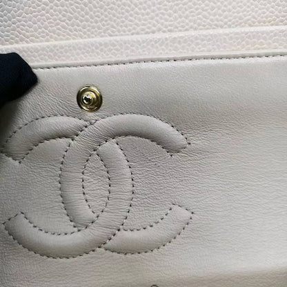 Sold Chanel Timeless Classic Flap 2011 Medium Beige Caviar Leather Gold HW