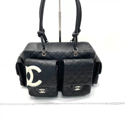 Chanel Cambon Multi-pocket Ligne Reporter Bag Large Black Calfskin Leather White Logo