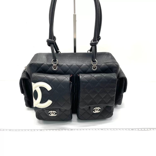 Chanel Cambon Multi-pocket Ligne Reporter Bag Large Black Calfskin Leather White Logo