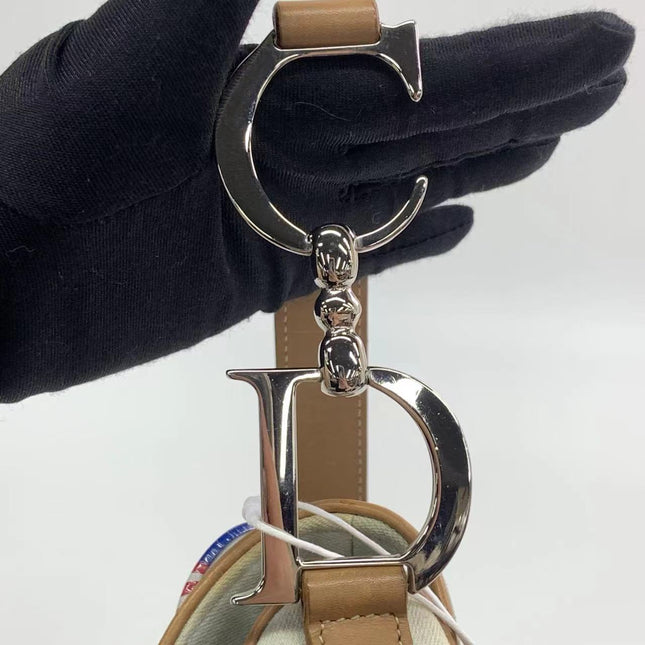Sold Dior Saddle Bag Vintage Miss Diorella in Blue Denim with Badges, Fall-Winter 2001