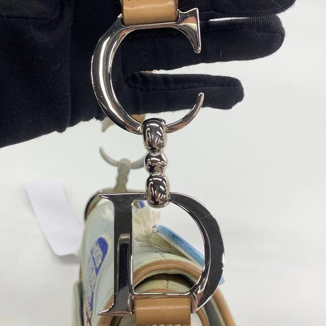 Sold Dior Saddle Bag Vintage Miss Diorella in Blue Denim with Badges, Fall-Winter 2001