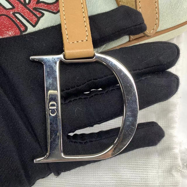 Sold Dior Saddle Bag Vintage Miss Diorella in Blue Denim with Badges, Fall-Winter 2001