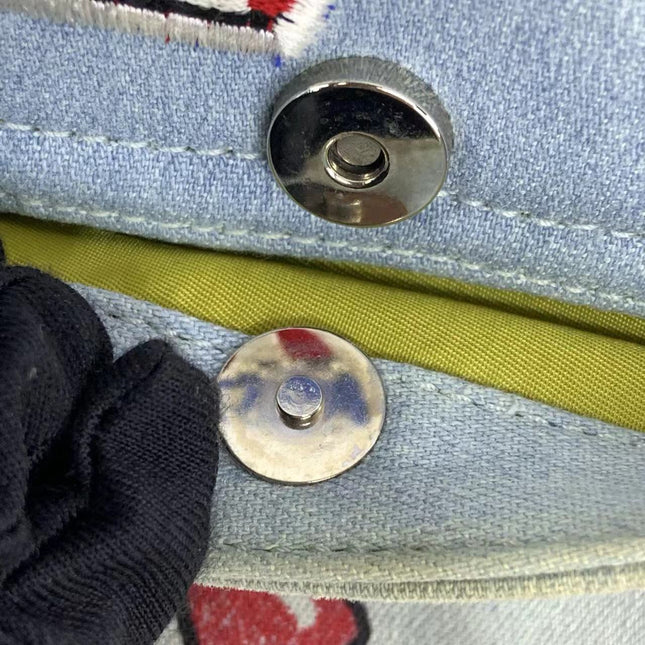 Sold Dior Saddle Bag Vintage Miss Diorella in Blue Denim with Badges, Fall-Winter 2001