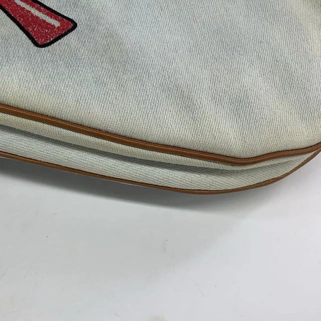 Sold Dior Saddle Bag Vintage Miss Diorella in Blue Denim with Badges, Fall-Winter 2001