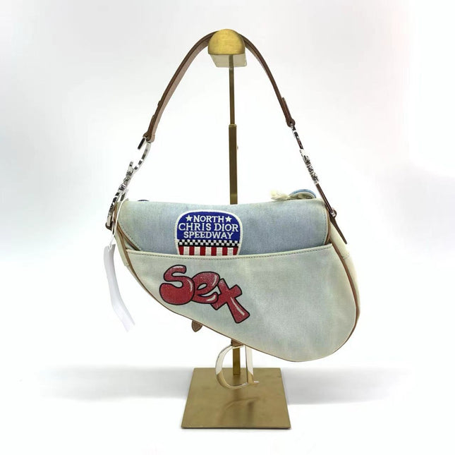Sold Dior Saddle Bag Vintage Miss Diorella in Blue Denim with Badges, Fall-Winter 2001