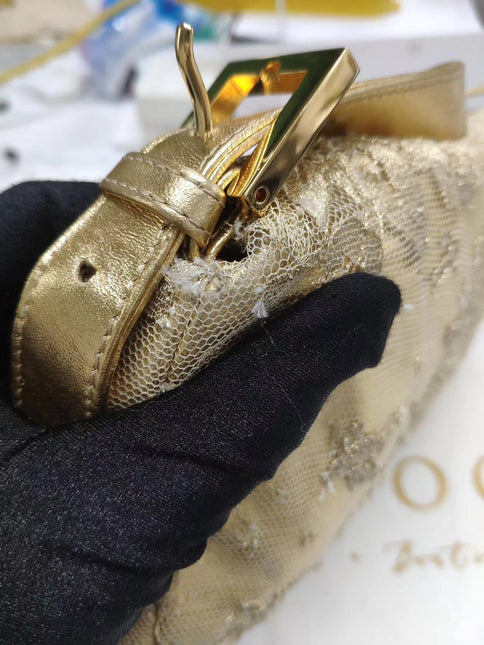 Sold Fendi Baguette Gold Leather with Lace Embroidery
