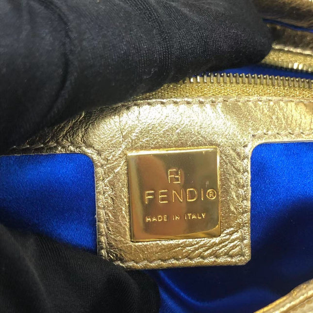 Sold Fendi Baguette Gold Leather with Lace Embroidery
