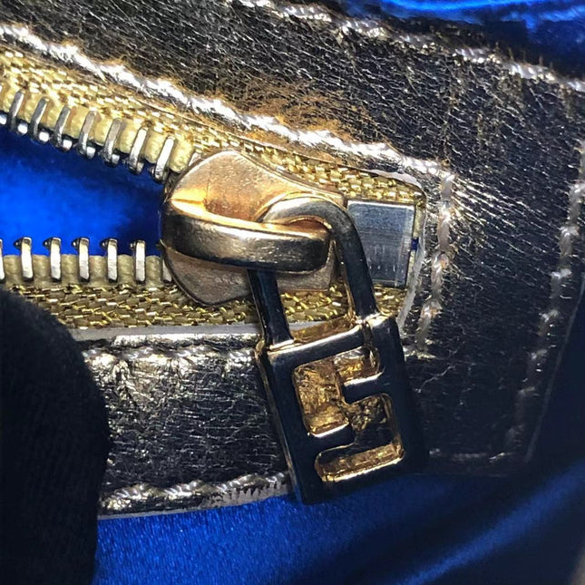 Sold Fendi Baguette Gold Leather with Lace Embroidery