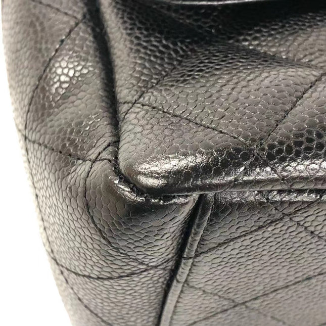 Sold Chanel Classic Flap Jumbo Black Caviar Leather Double Flap with Silver Hardware, 2014