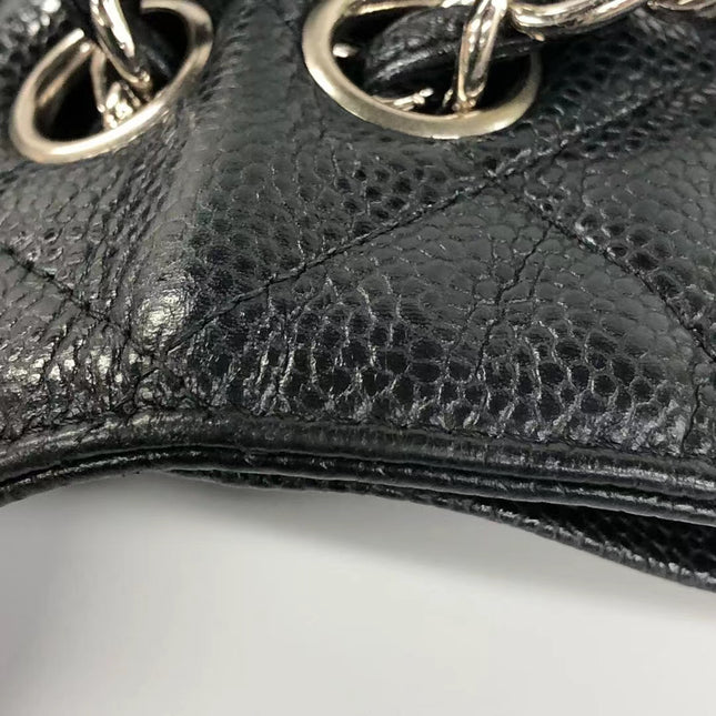 Sold Chanel Classic Flap Jumbo Black Caviar Leather Double Flap with Silver Hardware, 2014
