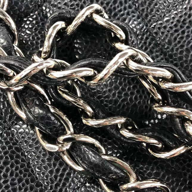 Sold Chanel Classic Flap Jumbo Black Caviar Leather Double Flap with Silver Hardware, 2014