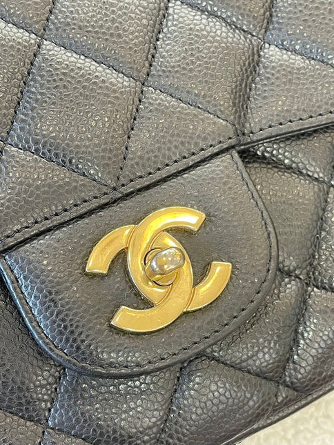 Sold Chanel Classic Flap Jumbo/Large Black Caviar Leather with Gold Hardware