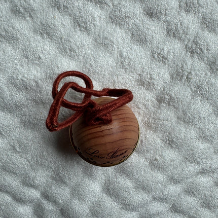 Loro Piana Perforated Wood & Coral Sphere Charm