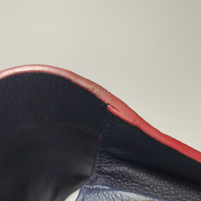 Louis Vuitton Pochette Métis Monogram Empreinte Leather Navy