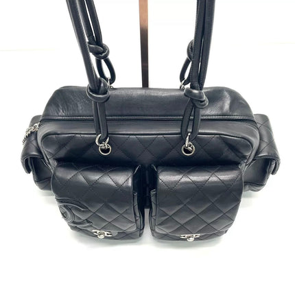 Sac Reporter Chanel Cambon multi-poches, taille moyenne, en cuir de veau noir avec CC noir