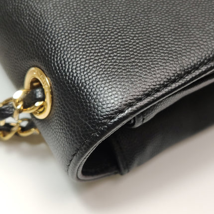 Sac à rabat Chanel Captain Gold petit, en cuir caviar noir
