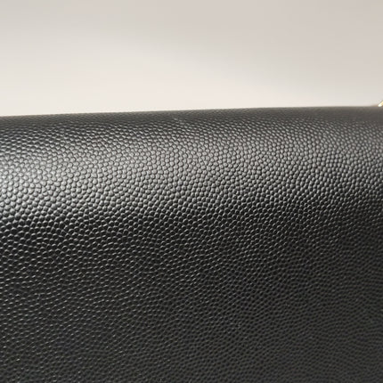 Sac à rabat Chanel Captain Gold petit, en cuir caviar noir