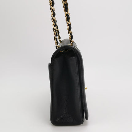 Sac à rabat Chanel Captain Gold petit, en cuir caviar noir