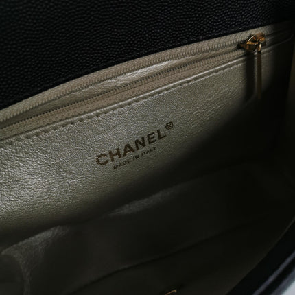 Sac à rabat Chanel Captain Gold petit, en cuir caviar noir