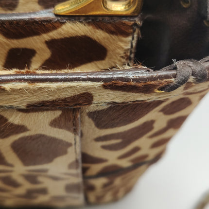 Sac bandoulière Prada Messenger en poulain imprimé léopard avec franges