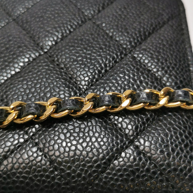 Chanel Wallet on Chain Classique rabat en cuir grainé noir, finition argentée