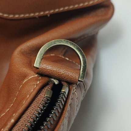 Sac de voyage Longchamp Au Sultan en cuir marron avec poignée et bandoulière en toile