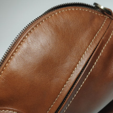 Sac de voyage Longchamp Au Sultan en cuir marron avec poignée et bandoulière en toile