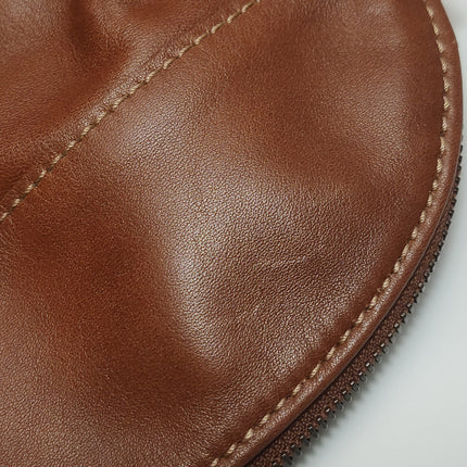 Sac de voyage Longchamp Au Sultan en cuir marron avec poignée et bandoulière en toile