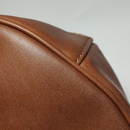 Sac de voyage Longchamp Au Sultan en cuir marron avec poignée et bandoulière en toile