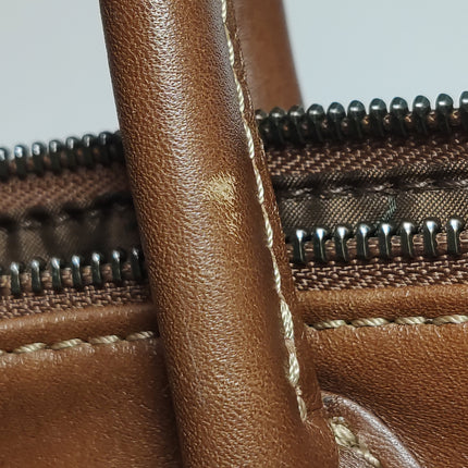 Sac de voyage Longchamp Au Sultan en cuir marron avec poignée et bandoulière en toile