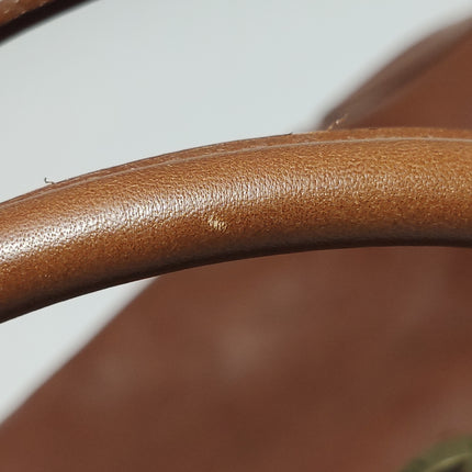 Sac de voyage Longchamp Au Sultan en cuir marron avec poignée et bandoulière en toile