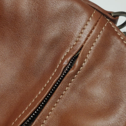 Sac de voyage Longchamp Au Sultan en cuir marron avec poignée et bandoulière en toile