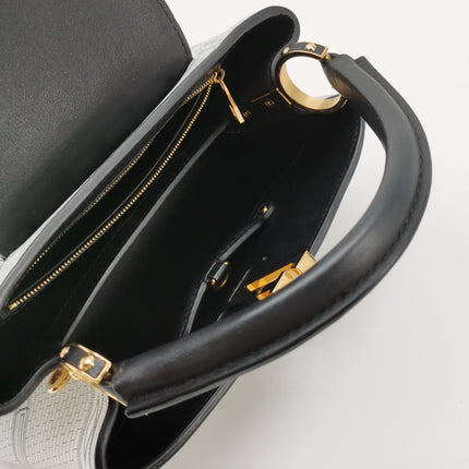 Sac bandoulière Louis Vuitton x Fornasetti Cannes Vase en cuir verni architectural