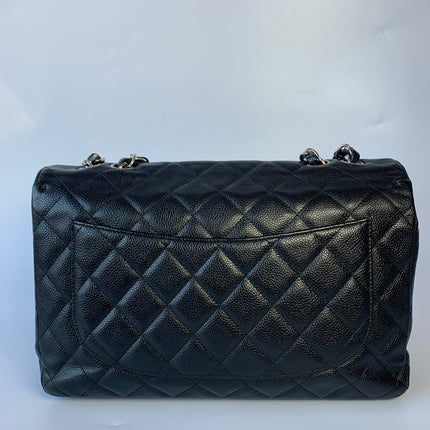 Sold Chanel Classic Flap Jumbo/Large Black Caviar Leather
