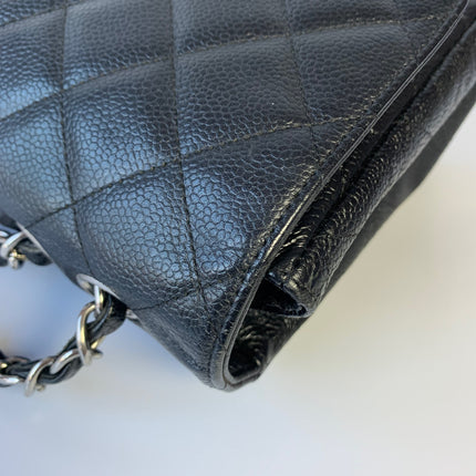 Sold Chanel Classic Flap Jumbo/Large Black Caviar Leather