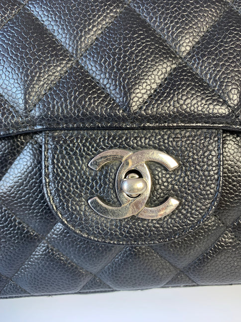 Sold Chanel Classic Flap Jumbo/Large Black Caviar Leather