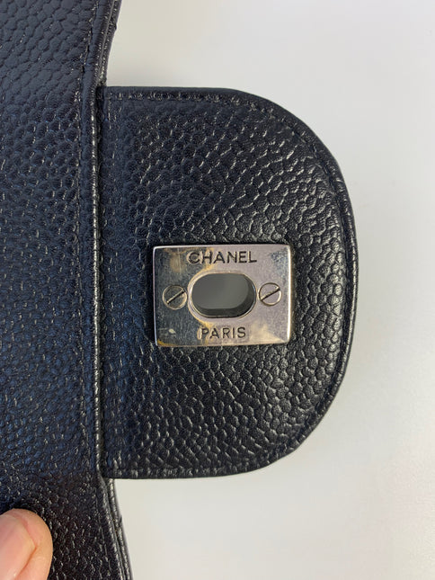 Sold Chanel Classic Flap Jumbo/Large Black Caviar Leather