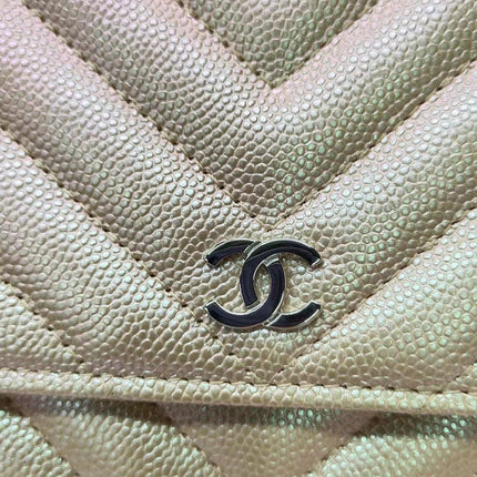 Sold Chanel WOC Wallet on Chain Chevron Champagne Iridescent Leather Bag