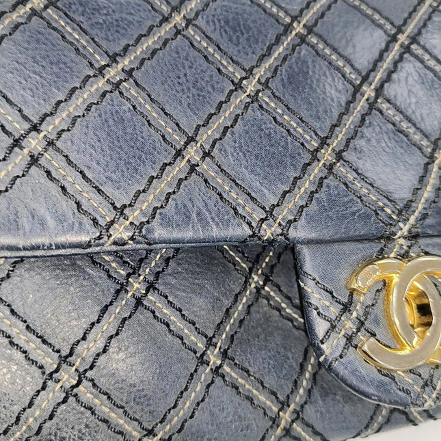 Sold Chanel Classic Flap 2014 Medium Navy Fabric Diamond Quilting Crossbody Bag