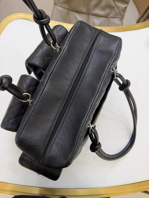 Chanel Cambon Multi-pocket Ligne Reporter Bag Large Black Calfskin Leather White Logo