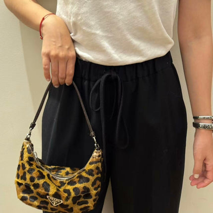 Prada Leopard Print Pony-style Calfskin Mini Clutch