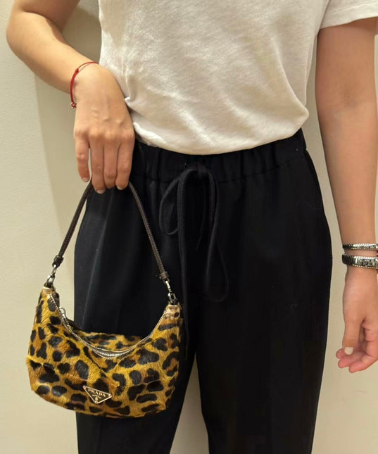 Prada Leopard Print Pony-style Calfskin Mini Clutch