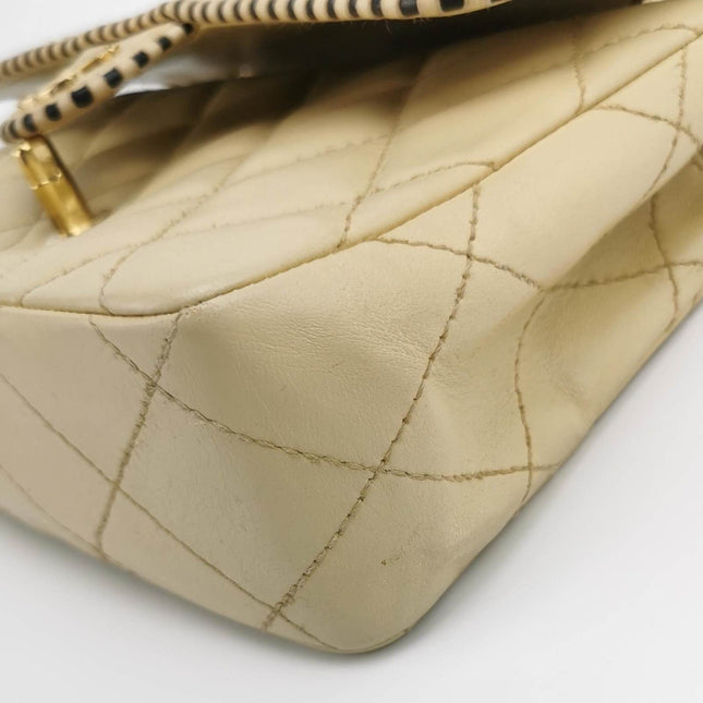 Sold Chanel Classic Flap Medium Happy Stitch Beige Leather with Contrast Black Trim